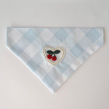 Small light blue and white checkered cotton bandana with a heart design featuring cherries on a white background